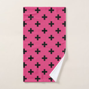 Black polka crosses on fuchsia hand towel