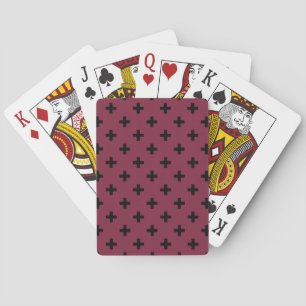 Black polka crosses on mulberry playing cards