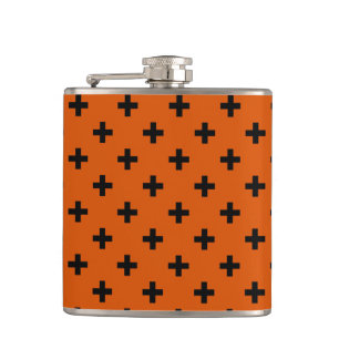 Black polka crosses on orange hip flask