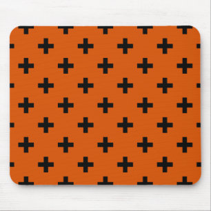 Black polka crosses on orange mouse pad