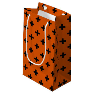Black polka crosses on orange small gift bag