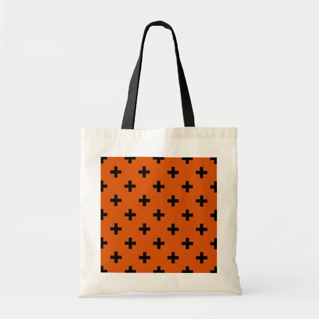 Black polka crosses on orange tote bag (Front)