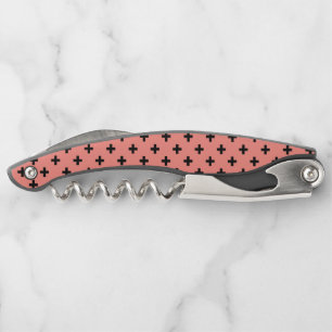 Black polka crosses on peach corkscrew