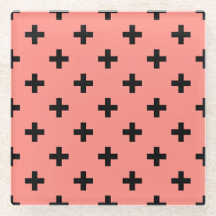 Black polka crosses on peach glass coaster