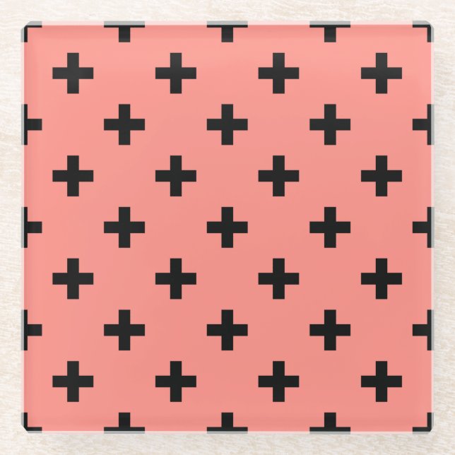 Black polka crosses on peach glass coaster (Front)