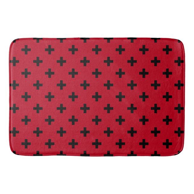 Black polka crosses on red bath mat (Front)