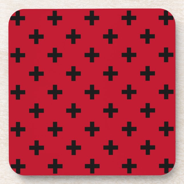 Black polka crosses on red coaster (Front)