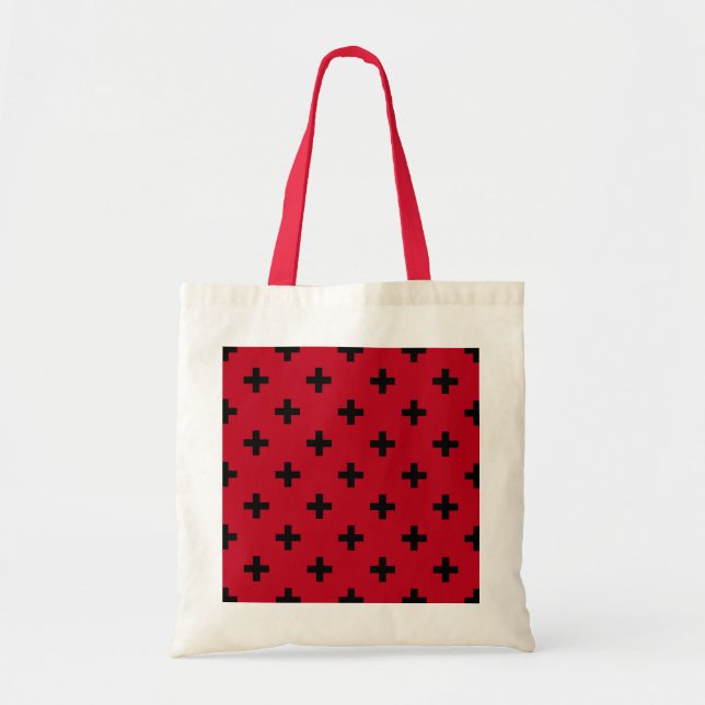 Black polka crosses on red tote bag (Front)