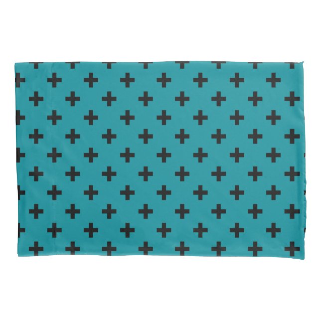 Black polka crosses on teal pillowcase (Front)