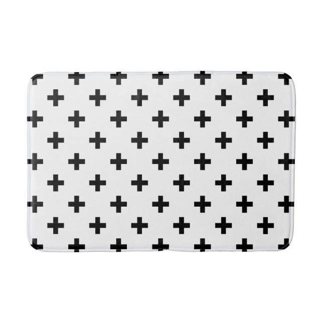 Black polka crosses on white bath mat (Front)