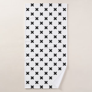 Black polka crosses on white bath towel