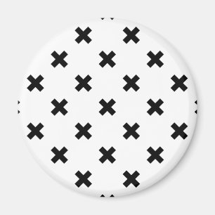 Black polka crosses on white magnet