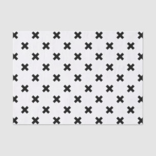 Black polka crosses on white tissue paper