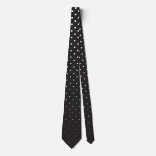 Black polka dots graduation and white background tie