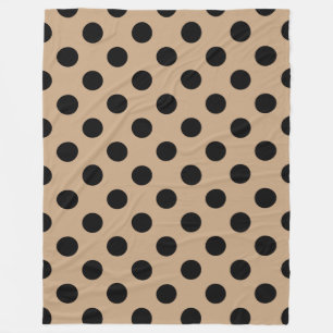 Black polka dots on beige fleece blanket