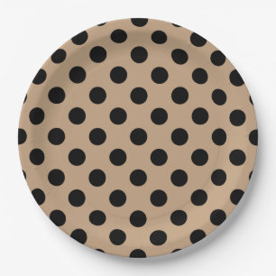Black polka dots on beige paper plate
