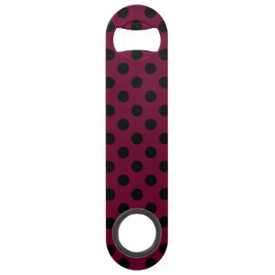 Black polka dots on burgundy