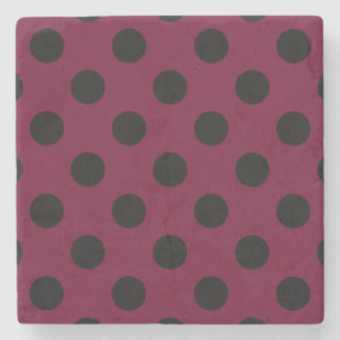 Black polka dots on burgundy stone coaster