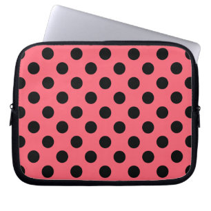 Black polka dots on coral laptop sleeve