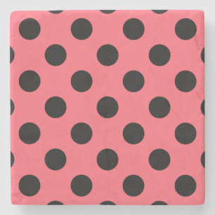 Black polka dots on coral stone coaster