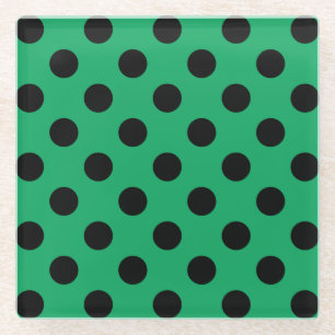 Black polka dots on fresh green glass coaster