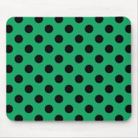 Black polka dots on fresh green