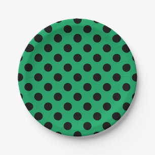 Black polka dots on fresh green paper plate