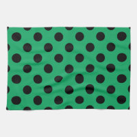 Black polka dots on fresh green