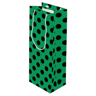 Black polka dots on fresh green wine gift bag
