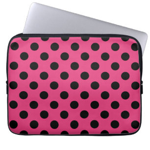 Black polka dots on fuchsia laptop sleeve