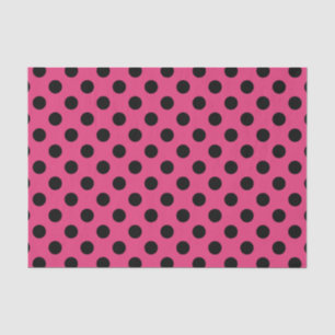 Black polka dots on fuchsia tissue paper