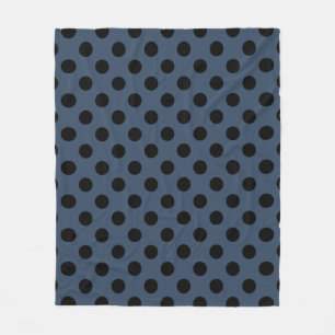Black polka dots on grey-blue fleece blanket