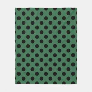 Black polka dots on kelly green fleece blanket