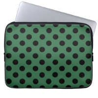Black polka dots on kelly green