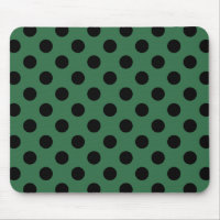 Black polka dots on kelly green