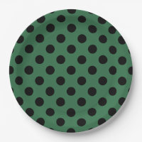 Black polka dots on kelly green