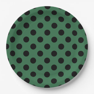 Black polka dots on kelly green paper plate