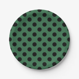 Black polka dots on kelly green paper plate