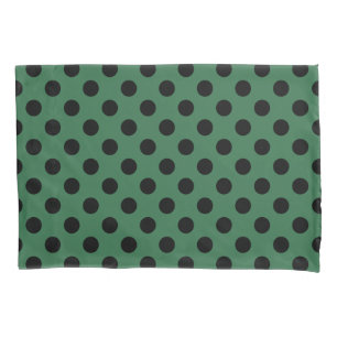 Black polka dots on kelly green pillowcase
