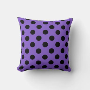 Black polka dots on lavender cushion