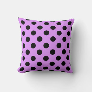 Black polka dots on lilac cushion