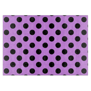 Black polka dots on lilac cutting board
