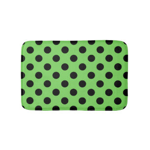 Black polka dots on lime green bath mat