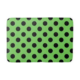 Black polka dots on lime green bath mat