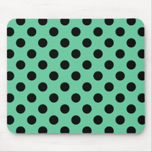 Black polka dots on mint green mouse pad