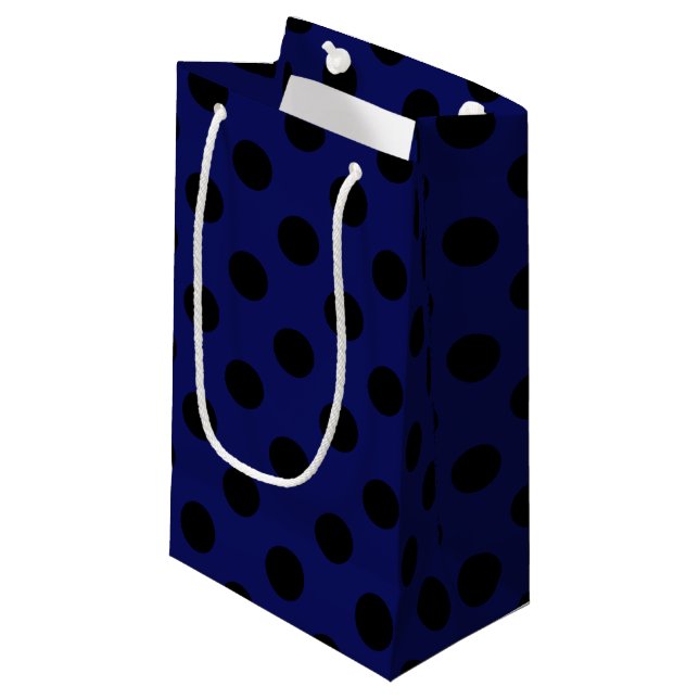 Black polka dots on navy blue small gift bag (Front Angled)