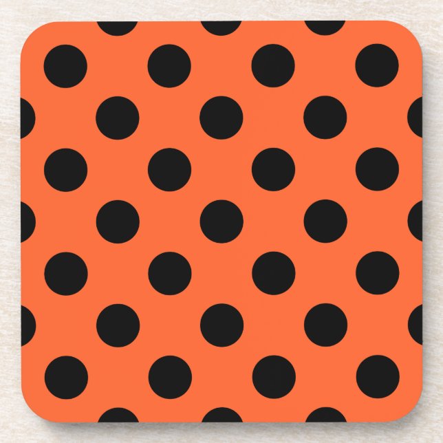 Black polka dots on orange coaster (Front)