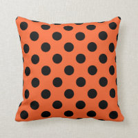 Black polka dots on orange