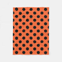 Black polka dots on orange