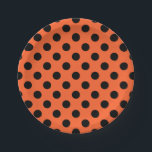 Black polka dots on orange paper plate<br><div class="desc">Black polka dots on orange</div>